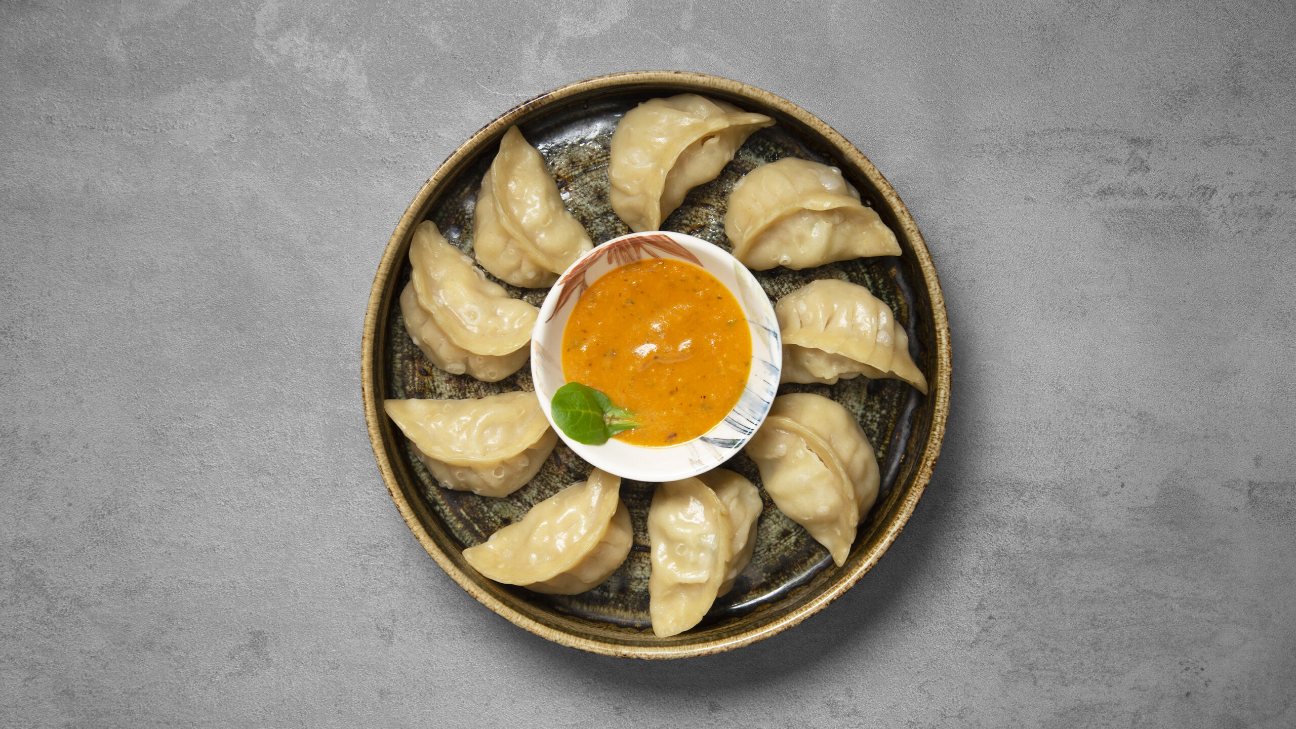 18. CHICKEN MOMO – 10 Stk